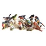 Twelve Beswick small bird models etc.