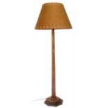 A Robert "Mouseman" Thompson oak standard lamp.