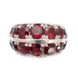 A garnet dress ring,