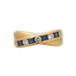 An 18ct gold sapphire and diamond band ring,