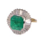 An 18ct gold emerald and diamond cluster ring,