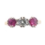 LOT WITHDRAWN An 18ct gold diamond and ruby three stone ring,