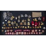 A collection of Royal Artillery Medical Core cap badges