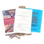 Three Martini Henry books and cases