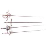 Paul fencing foil, also two rapiers and one other double edged sword.