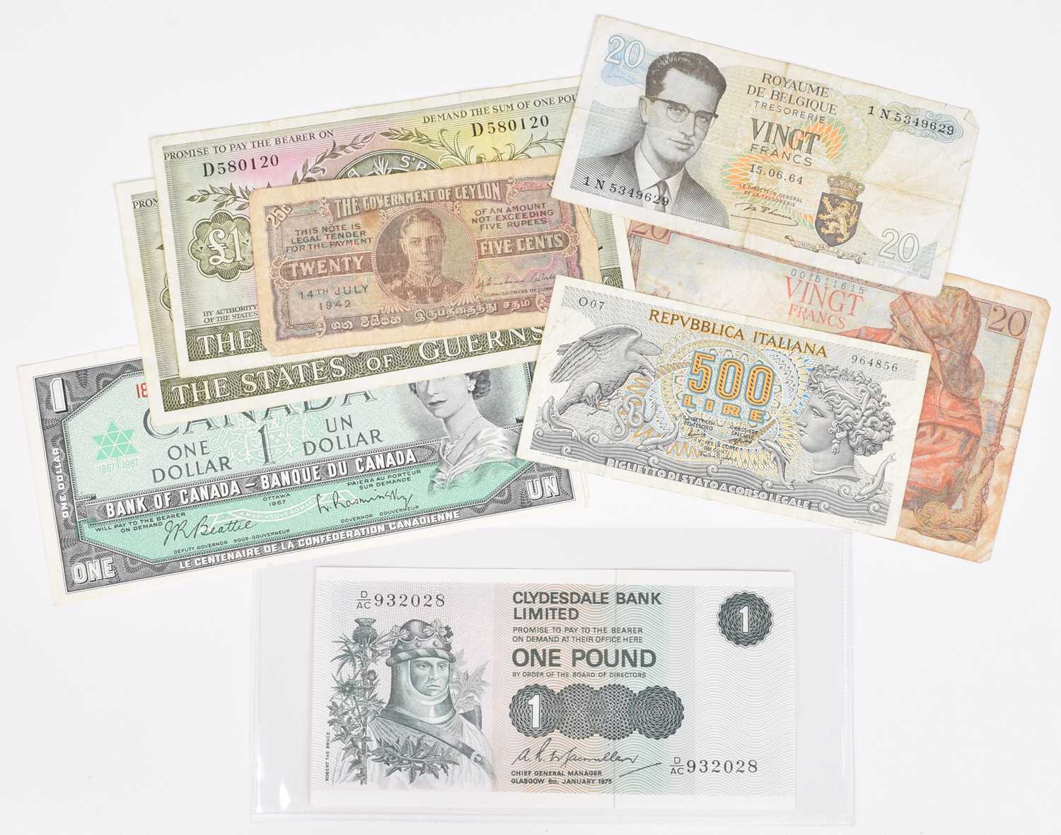 Selection of British and foreign banknotes.