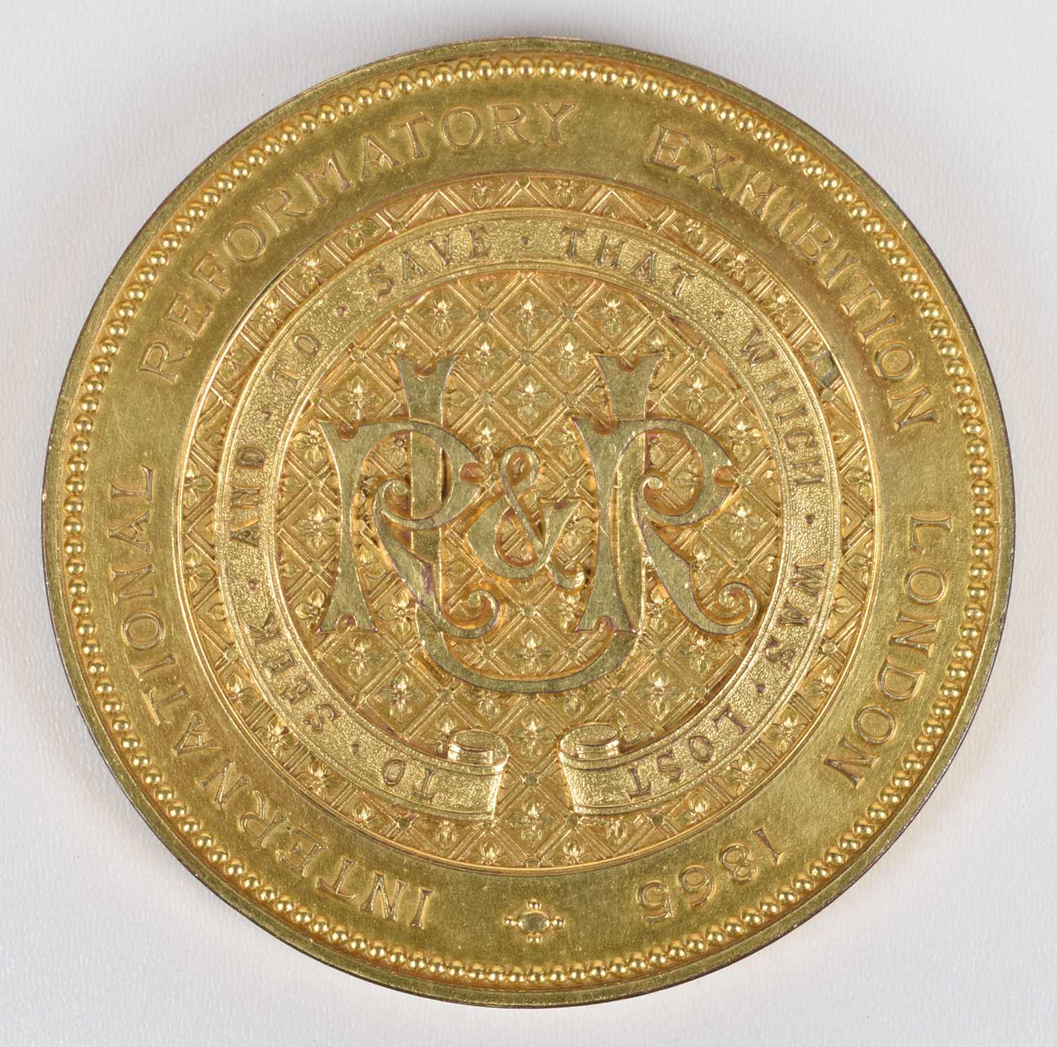 England, International Reformatory Exhibition, London, 1865, a gilt-bronze medal by J.S. Wyon. - Image 2 of 2