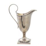 A George V silver helmet shaped jug,