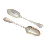 A pair of George II silver table spoons,