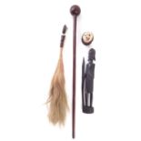 African Knobkerrie, fly whisk figure and an Asian carved pierced ball.