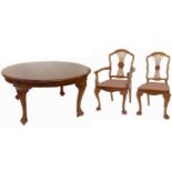 Early 20th-century walnut dining room suite
