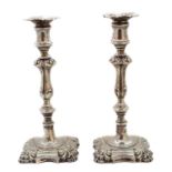 A pair of Victorian silver candlesticks,