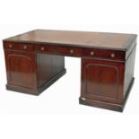 A late Victorian mahogany Partners desk