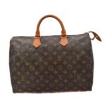 A Louis Vuitton monogram Speedy 35 handbag,