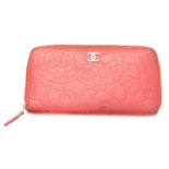 A Chanel Floral Embossed Zip Around Wallet,
