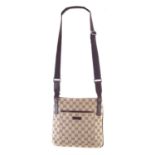 A Gucci monogram canvas Messenger Crossbody shoulder bag,