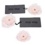 Three Miu Miu corsage brooches,