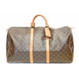 A Louis Vuitton monogram Keepall 55 luggage bag,