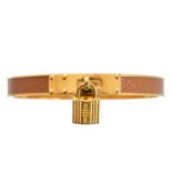 A Hermes Kelly bangle,