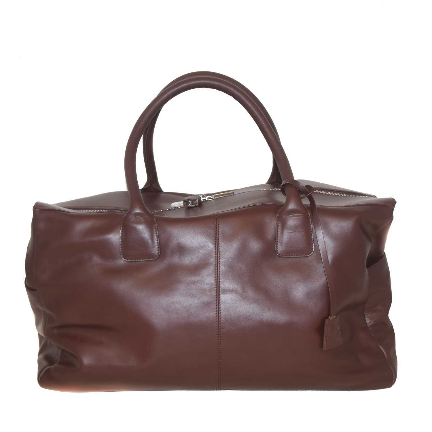 A Molton Brown leather luggage bag,