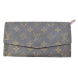 A Louis Vuitton Vintage Long Wallet,