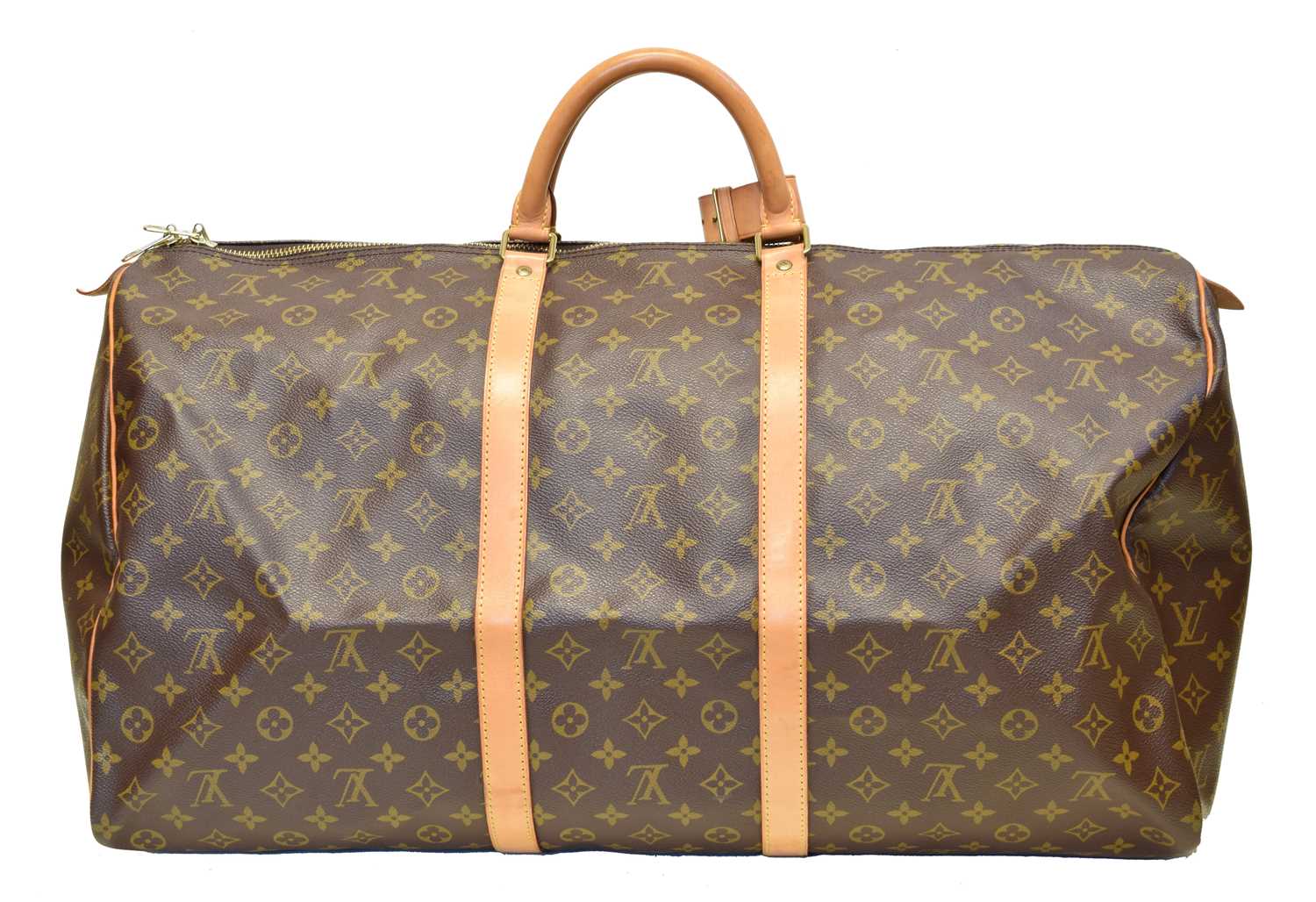 A Louis Vuitton monogram Keepall 60 luggage bag,