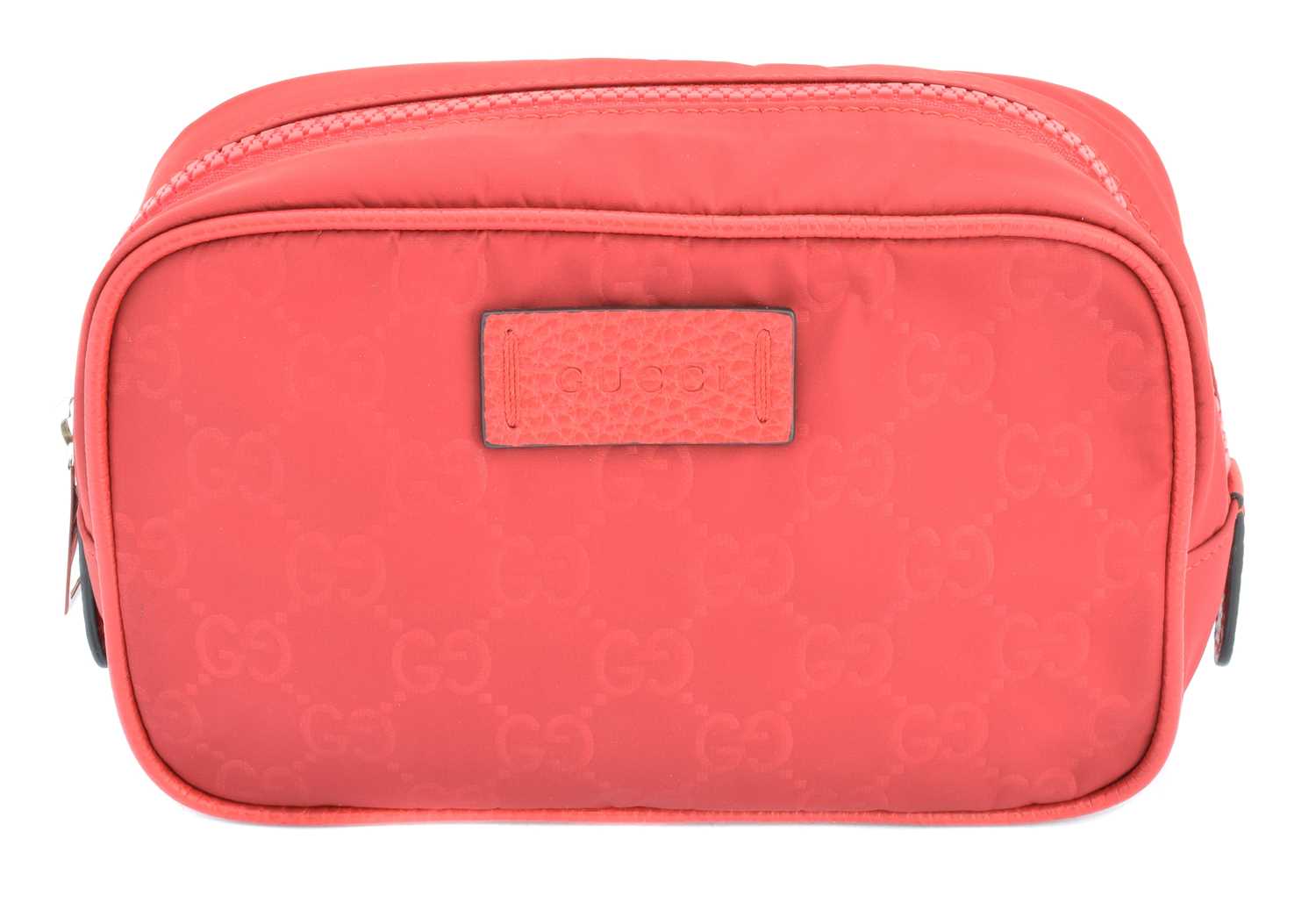 A Gucci cosmetic case pouch,