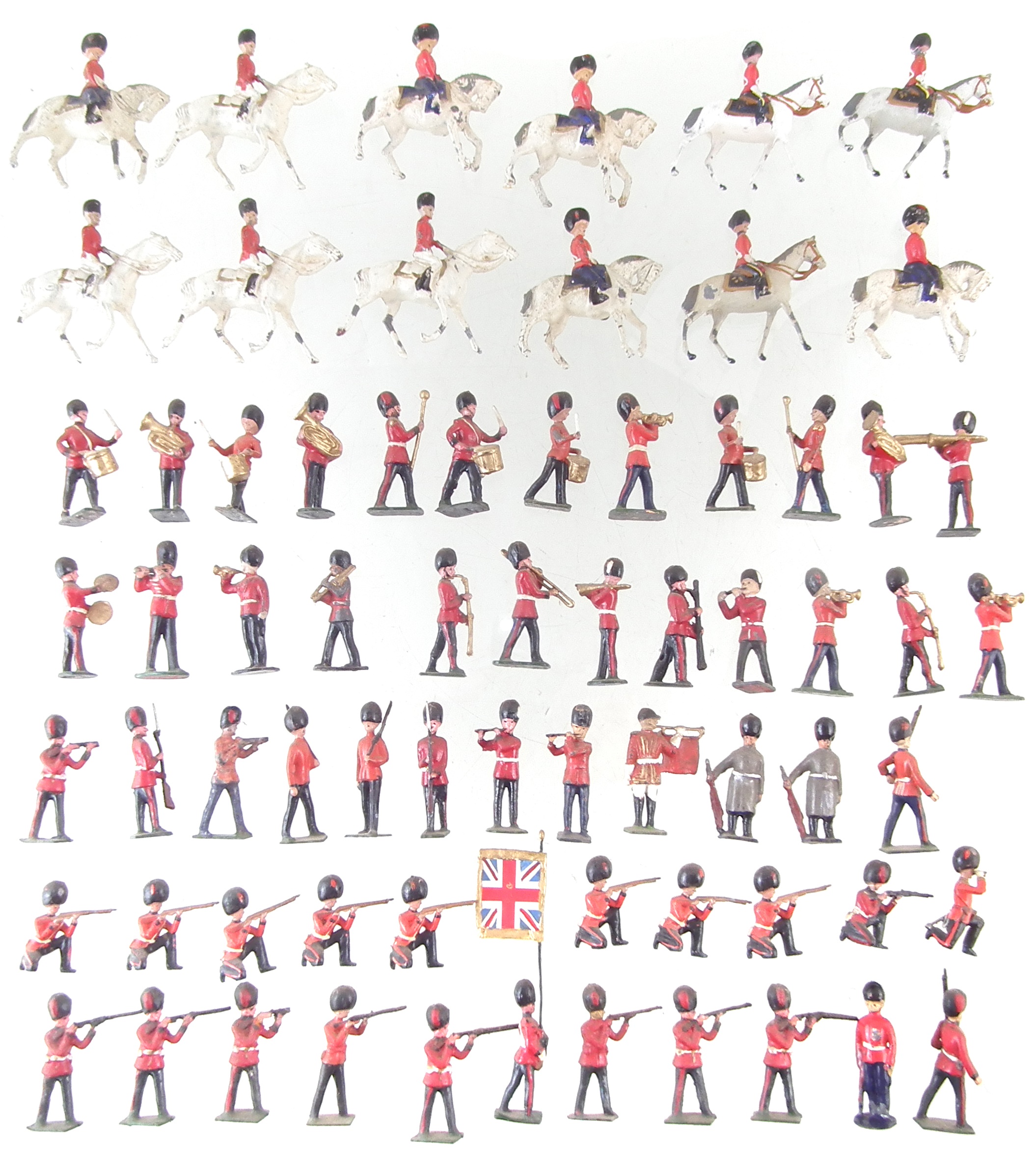 Fifty seven metal British infantry soldiers by J. Hill and Co. and twelve mounted troopers.