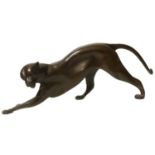 20th-century bronze figure of a stalking Jaguar in a crouched pose.