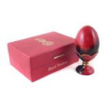 Royal Doulton flambe egg and stand,