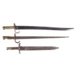 Three bayonets and scabbards,