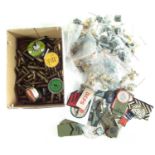 Collection of Military buttons, patches, empty ammunition cases etc