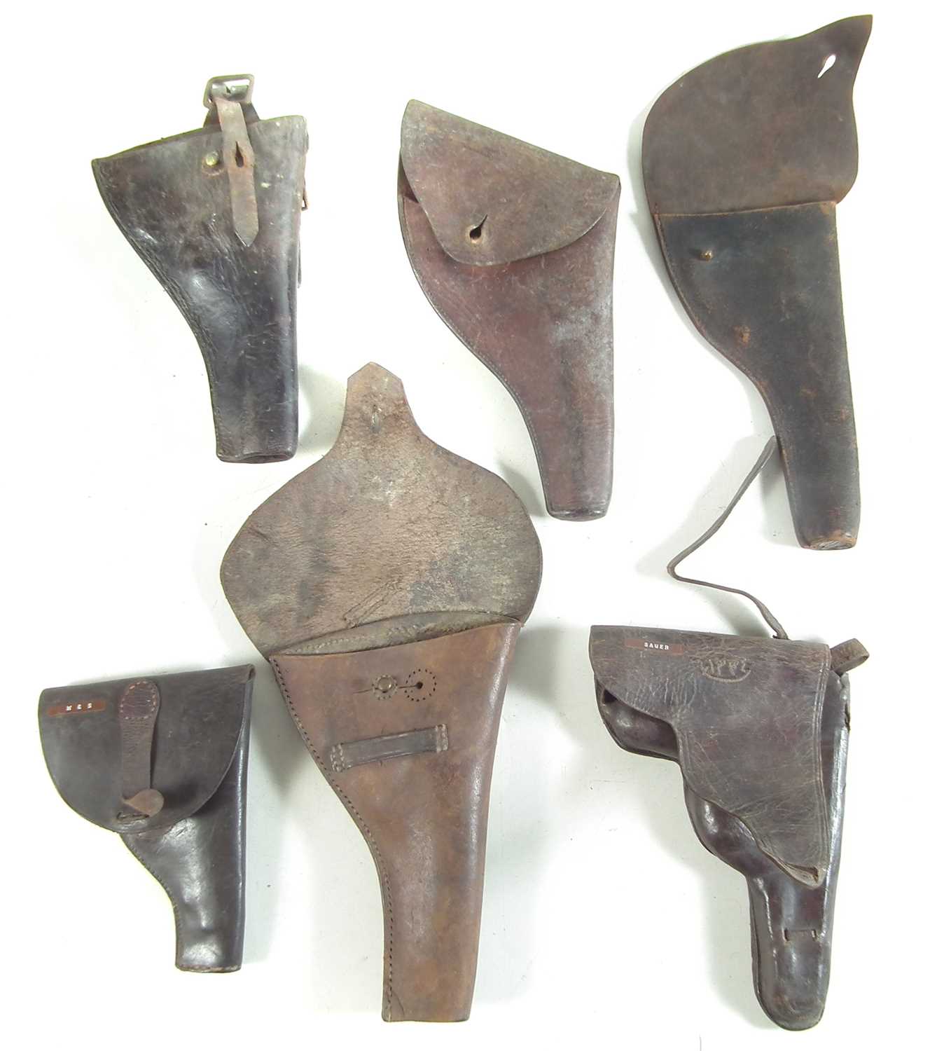 Six various leather pistol holsters