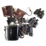 Five pairs of binoculars