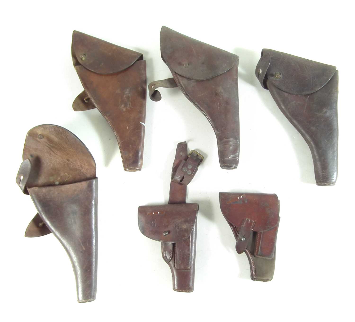 Six various leather pistol holsters