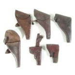 Six various leather pistol holsters