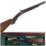 Perrins percussion 12 bore shotgun with a period case