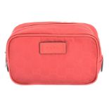 A Gucci cosmetic case pouch,