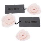 Three Miu Miu corsage brooches,