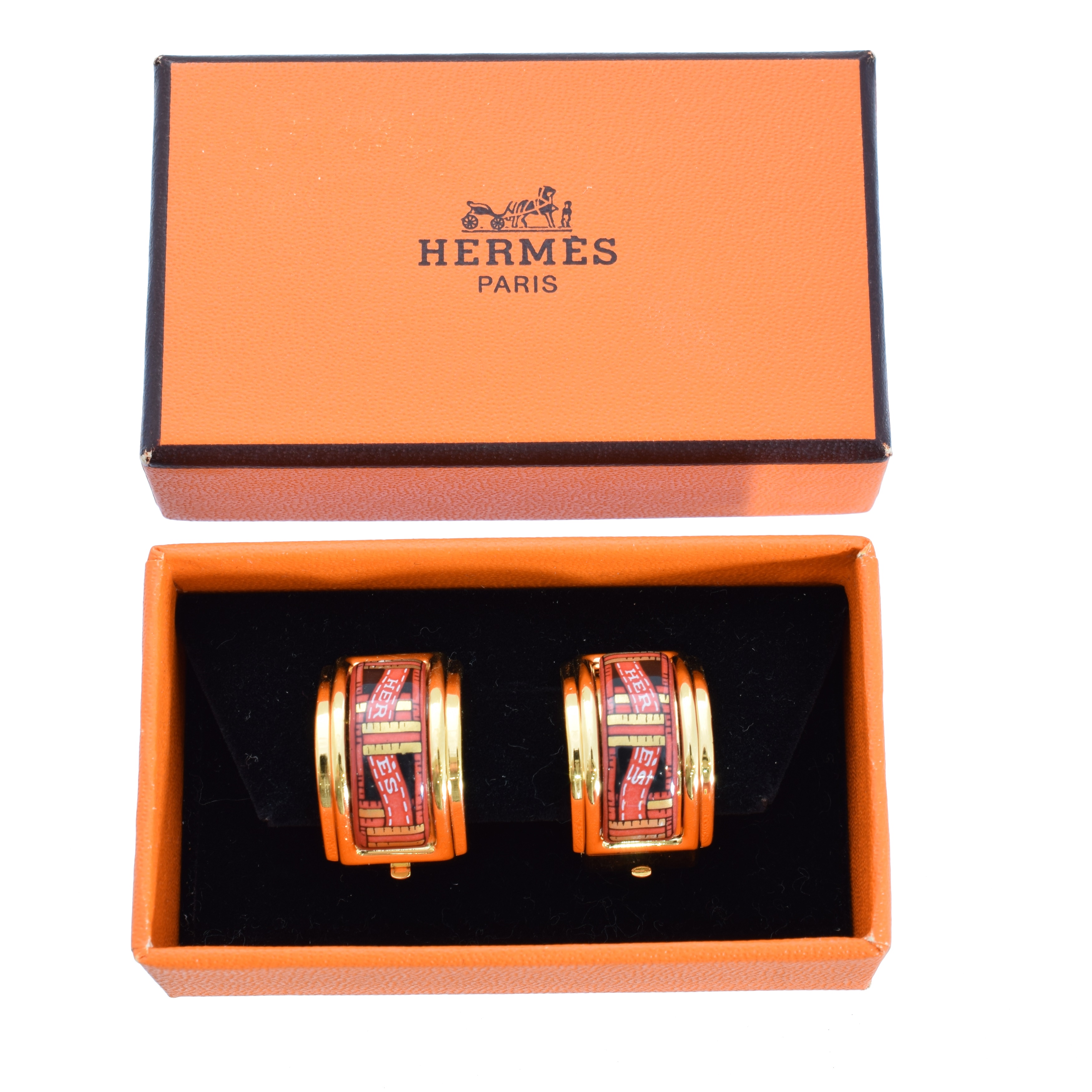 A pair of Hermes logo ribbon earrings,