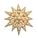 An early 20th century split pearl star brooch,