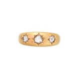 A late Victorian 18ct gold diamond three stone ring,