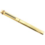 A Cartier gold plated Trilogy pen,
