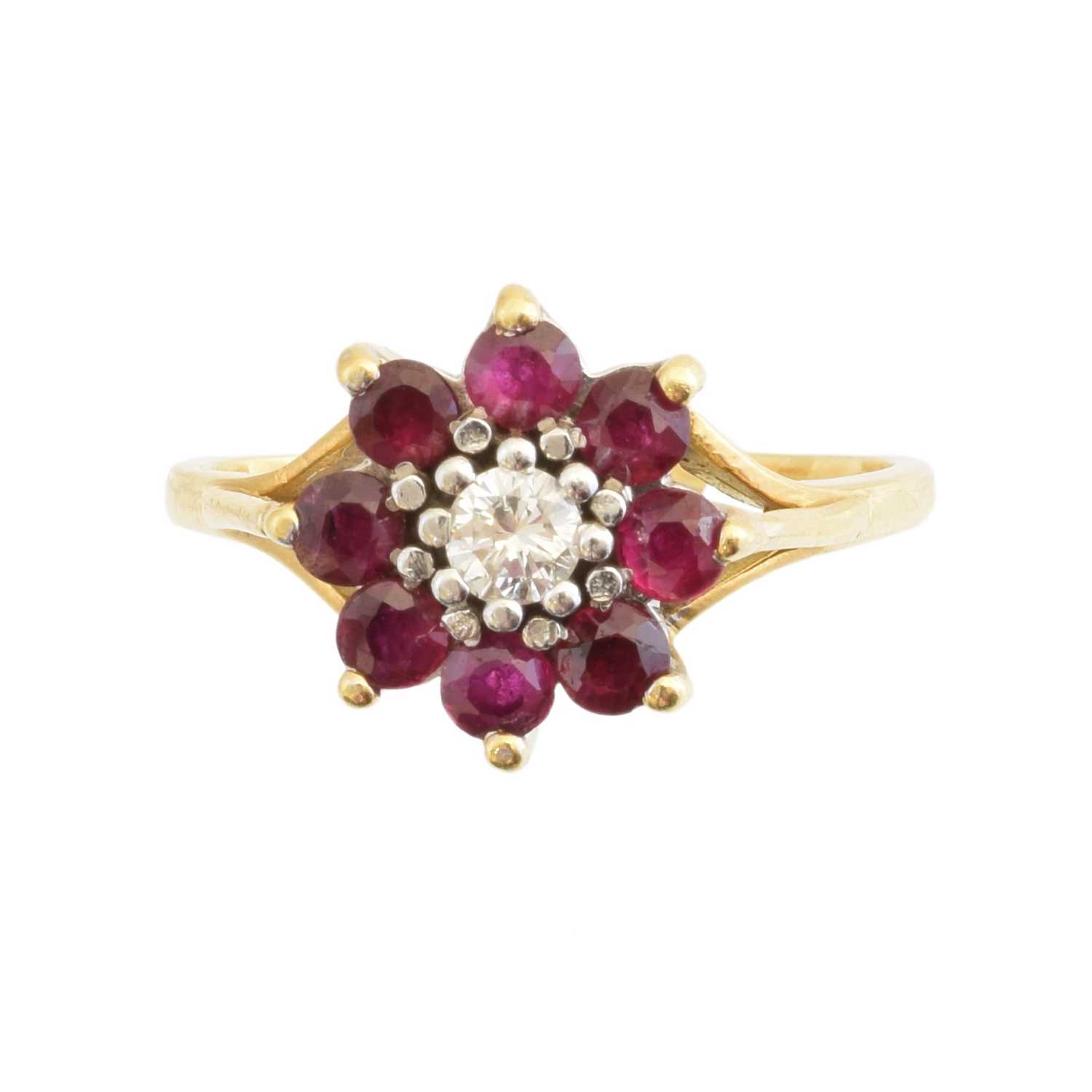 An 18ct gold ruby and diamond cluster ring,