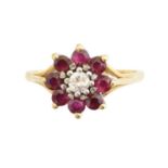 An 18ct gold ruby and diamond cluster ring,