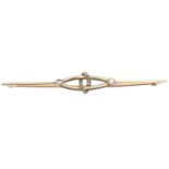 An early 20th century diamond bar brooch,