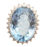 A blue topaz and diamond cluster ring,