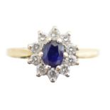 An 18ct gold sapphire and diamond cluster ring,