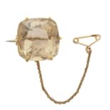 A citrine brooch,