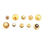 A selection of dress studs,